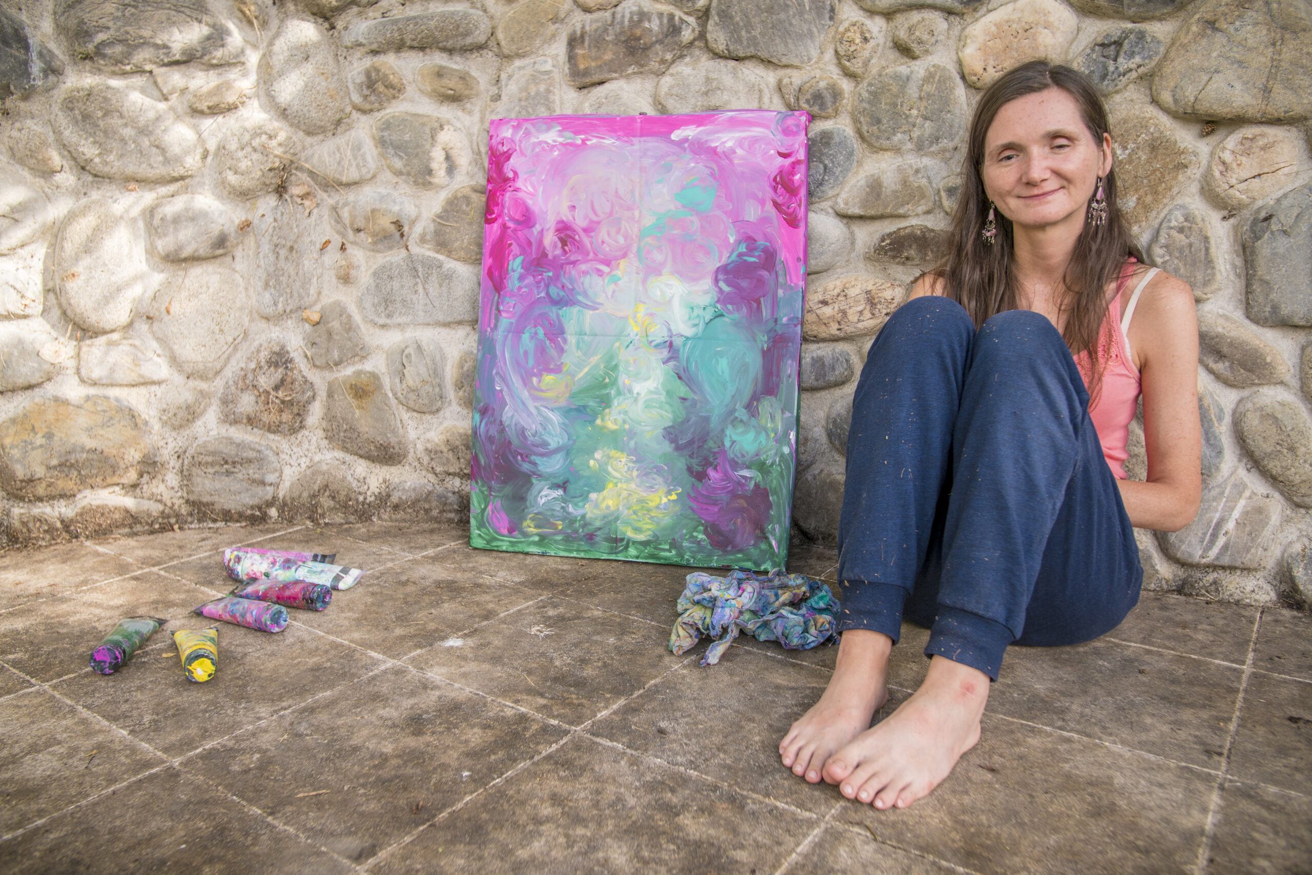 Nicol in the process of creating a painting